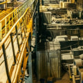 What role does material handling play in the warehousing process?